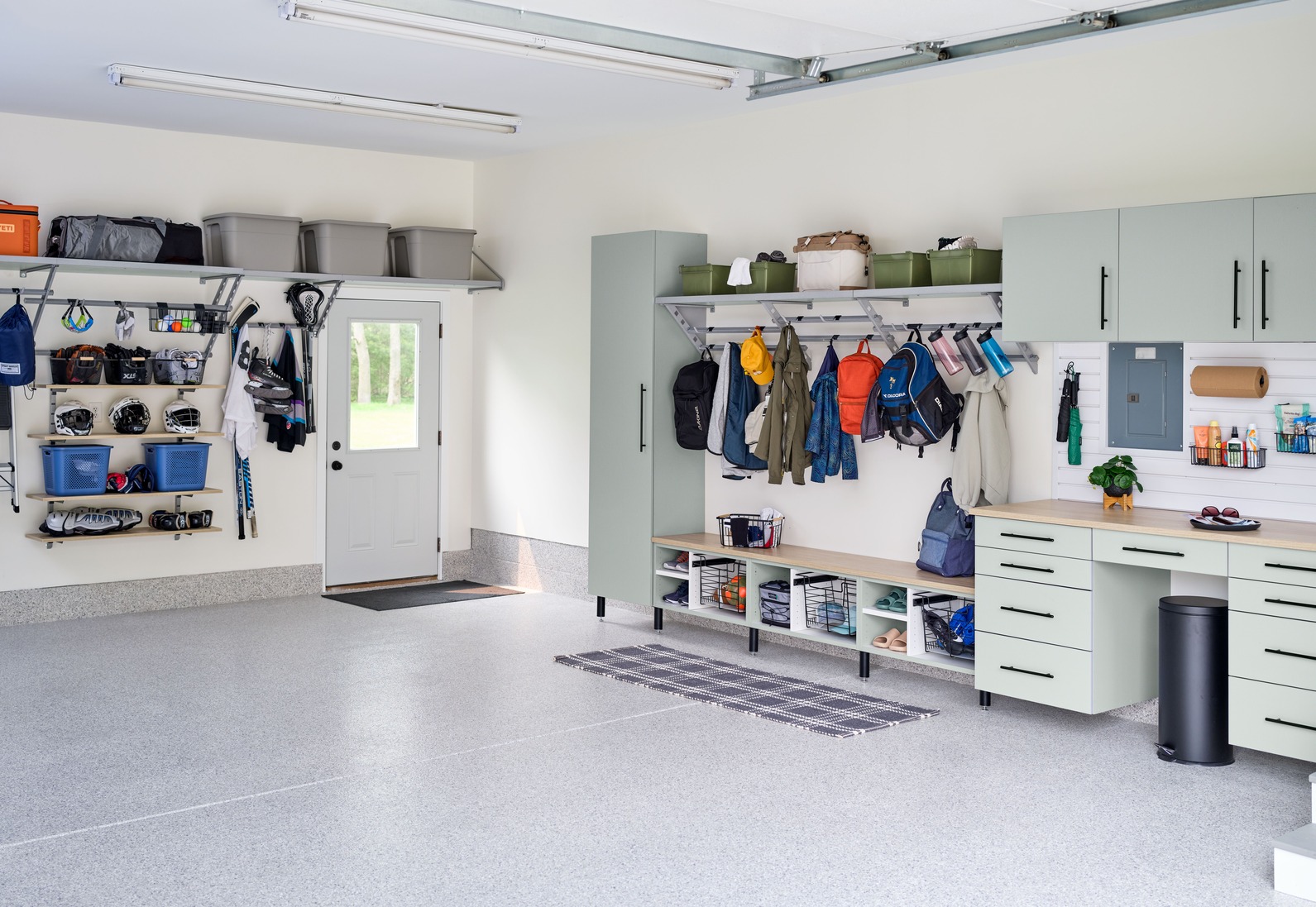 Garage cabinets and organized storage system in a Sussex County, Delaware home