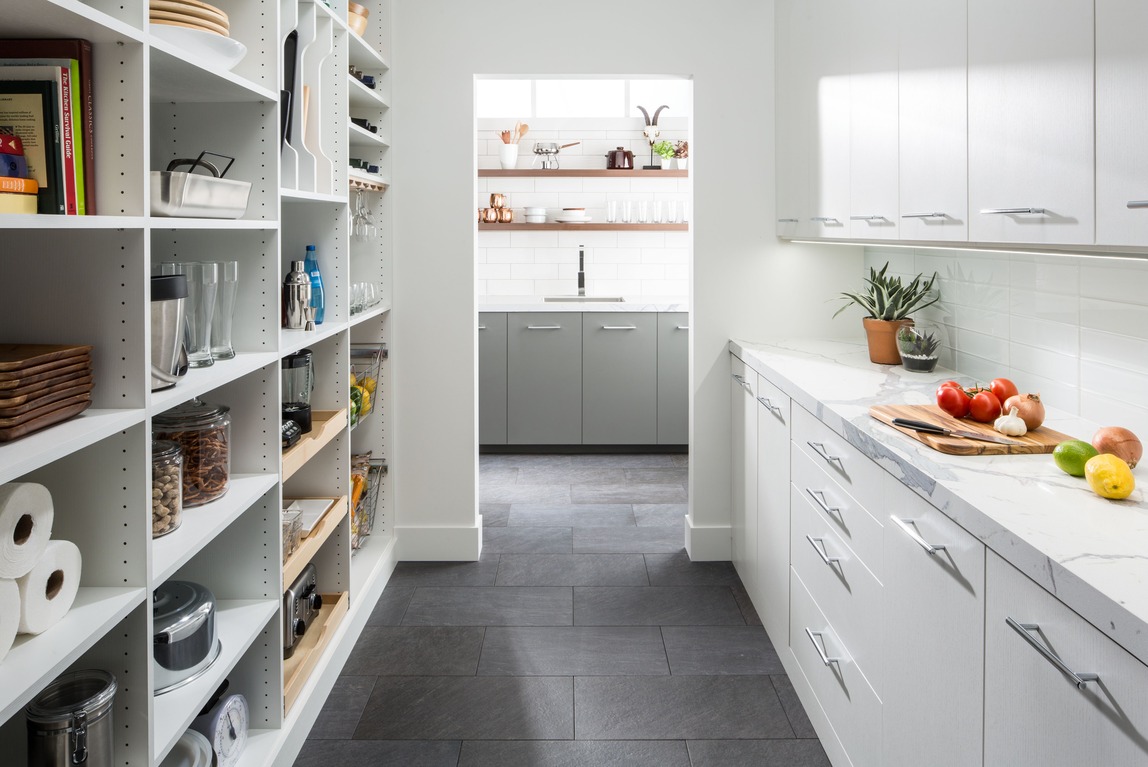 Custom pantry with pull-out shelves and humidity-resistant finishes in a Lewes, Delaware kitchen