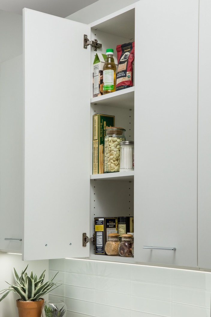 Fully fitted pantry with shelving, drawers, and counter by Atlantic Source, Delaware