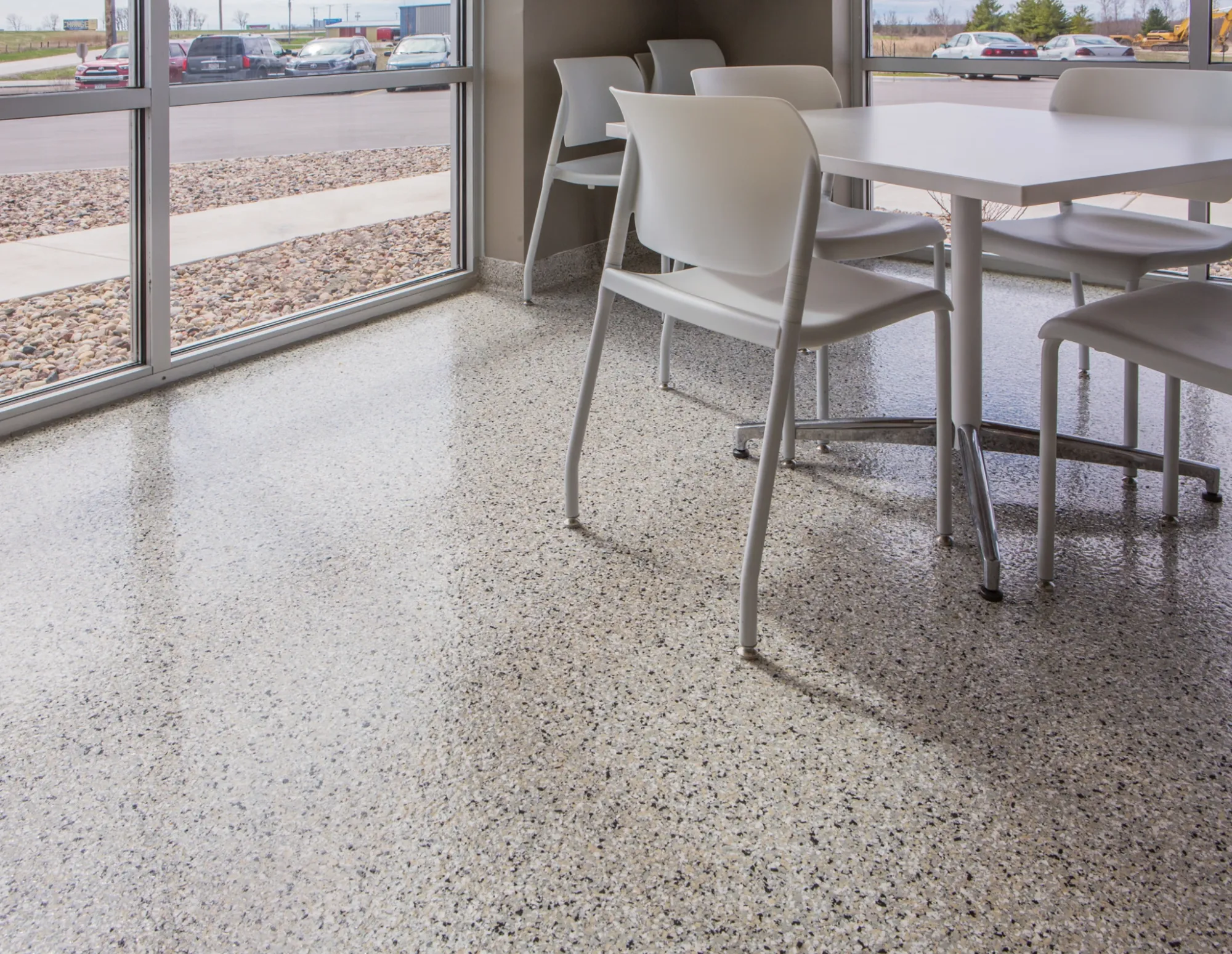 Seamless high-gloss epoxy floor in a bright interior space — Atlantic Source, Millville DE