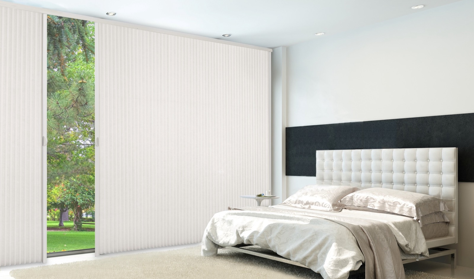 Roller-style Softlight shade drawn across a bright window