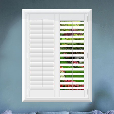 Plantation shutter with a traditional divider rail so top and bottom louvers tilt separately