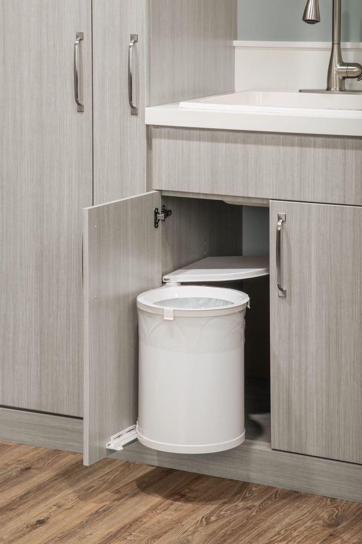 Custom laundry room storage and organization detail