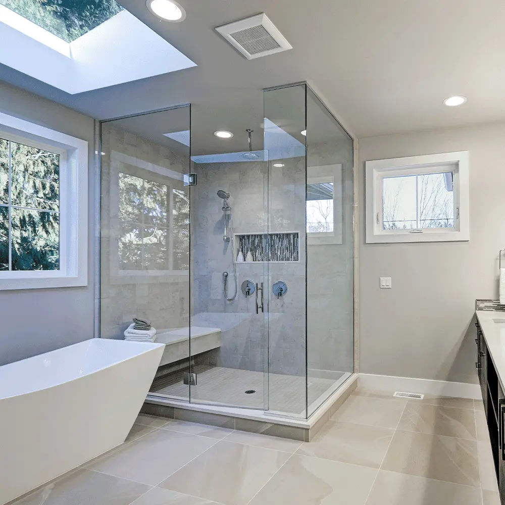 Custom walk-in shower enclosure with glass panel